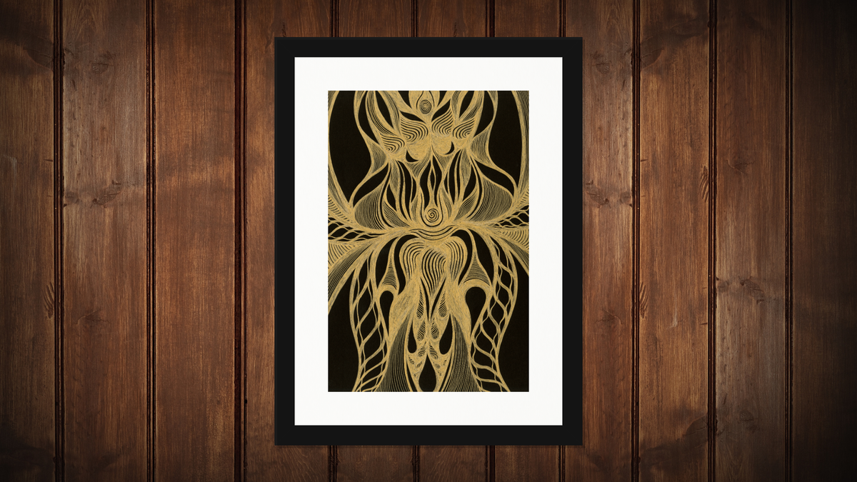 A framed abstract art print featuring intricate gold line art on a black background, mounted on a dark brown wood-paneled wall.